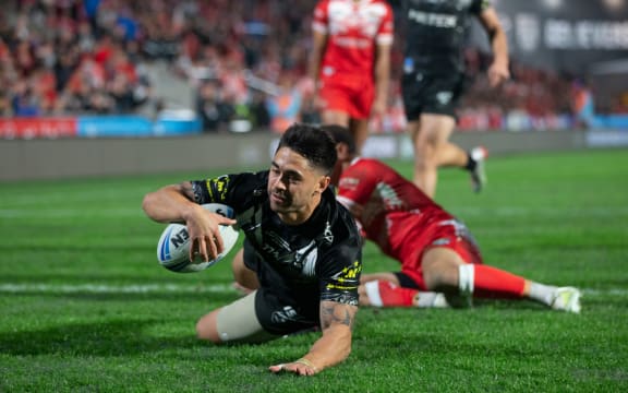 Kiwis player Shaun Johnson scores against Tonga, during rugby league Test match between Kiwis and Tonga, held at Mt Smart Stadium.