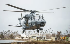 A Royal New Zeland Air Force helicopter landing in Fiji during the cyclone that hit in March.
