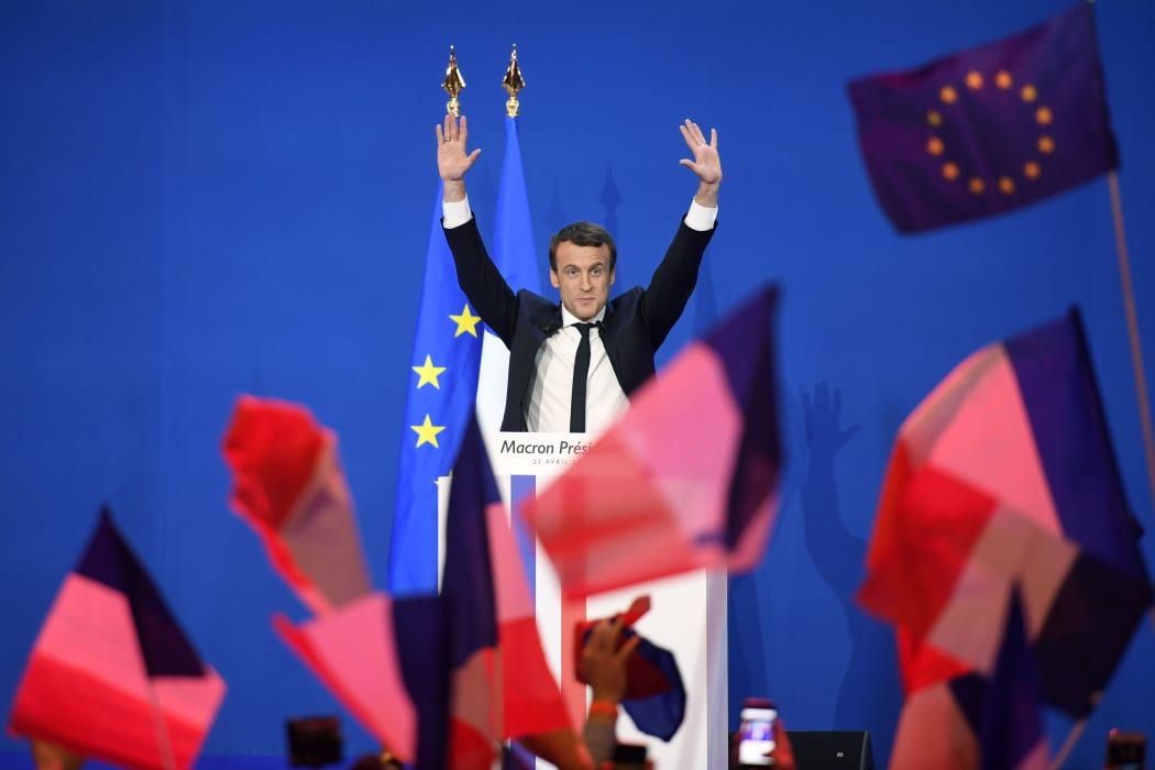 Emmanuel Macron speaking to supporters after the first round of voting in the French presidential election.