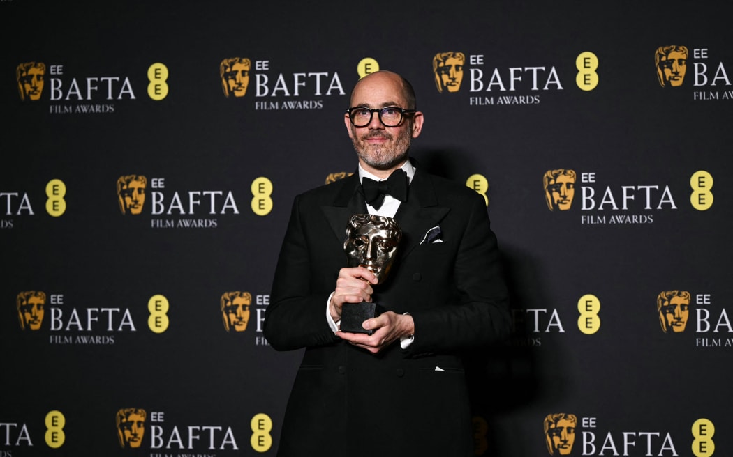 German director Edward Berger poses with the award for Best film for Conclave during the BAFTA British Academy Film Awards ceremony at the Royal Festival Hall, Southbank Centre, in London, on 16 February, 2025.