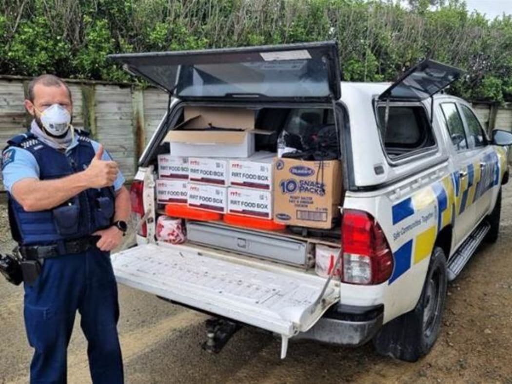 A Police vehicle packed with food boxes in Maungaturoro - Senior Constable Llew Smart in Maungaturoto has also been handing out food boxes in his area along with messages of support and help with information where required.