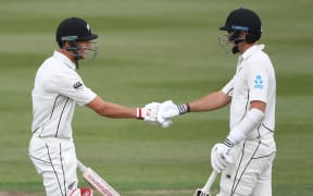 Trent Boult, left, and Tim Southee at the crease together.