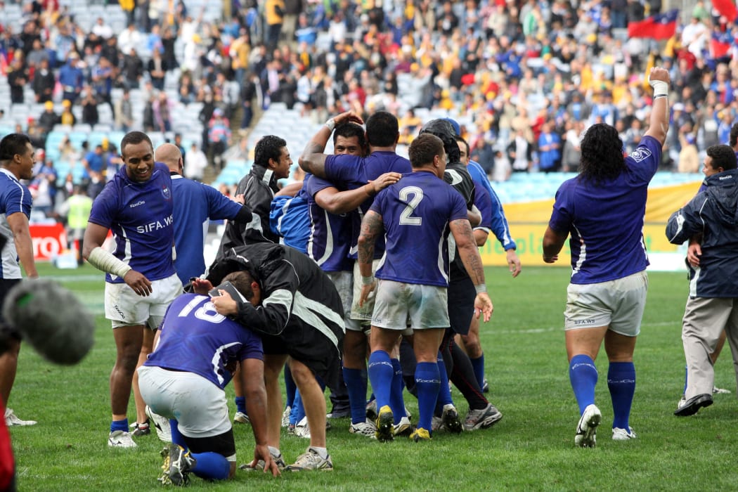 Samoa celebrate beating Australia in 2011.