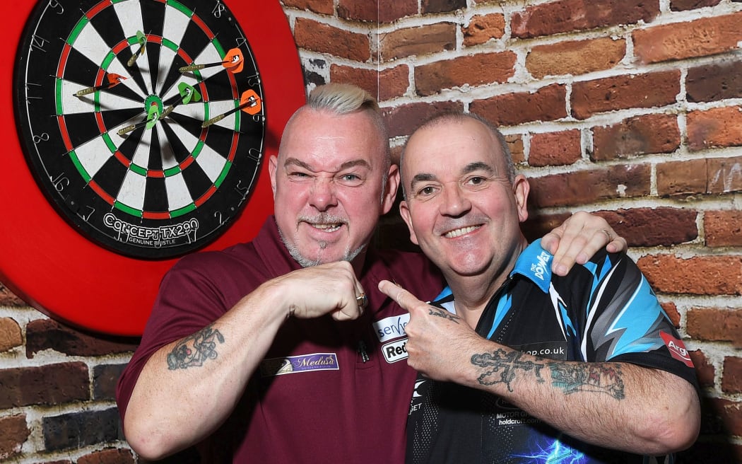 "Snake-bite" Peter Wright (L) and Phil "The Power" Taylor.