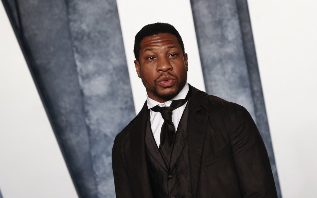 US actor Jonathan Majors attends the Vanity Fair 95th Oscars Party at the The Wallis Annenberg Center for the Performing Arts in Beverly Hills, California on March 12, 2023. (Photo by Michael TRAN / AFP)