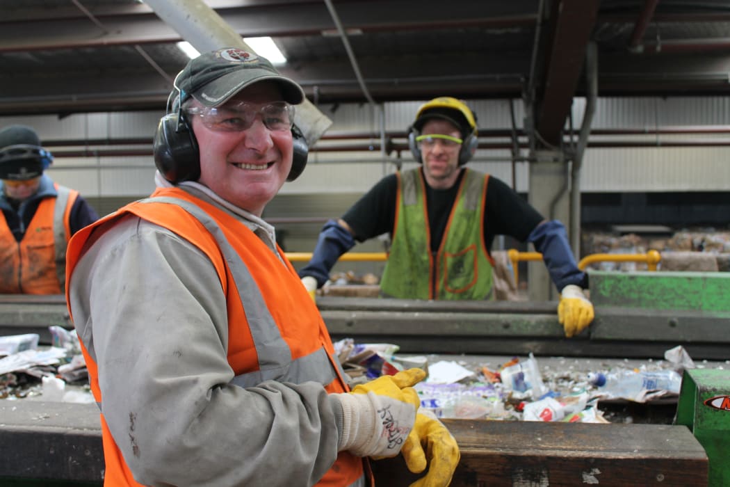 A photo of Alistair Hatton and Paul Burtenshaw on the recycling sortline