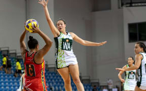 Cook Islands Wing Attack Rochelle Teiri in full flight against PNG.