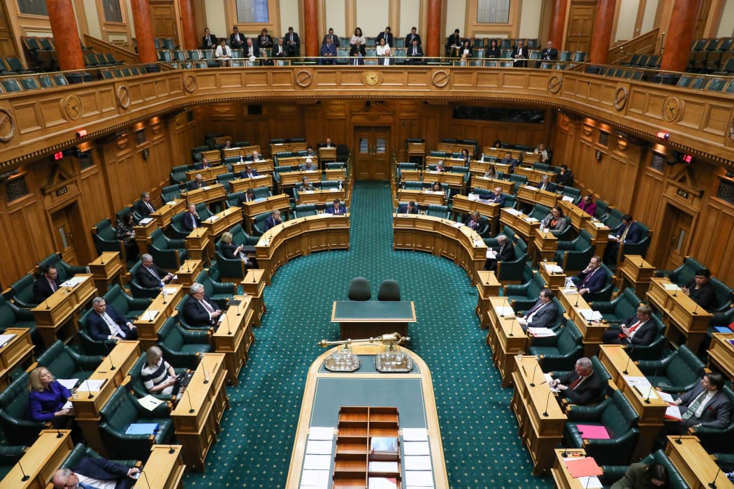 MPs are spaced out in the debating chamber with some sitting in the Speaker's gallery above to comply with Covid-19 distancing rules