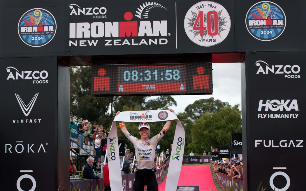 Chelsea Sodaro celebrates her first placing, at the Taupō Ironman.
