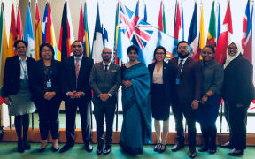 Fiji's UN Representative, Nazhat Shameem Khan (centre) at the Fiji Mission to the UN in Geneva.