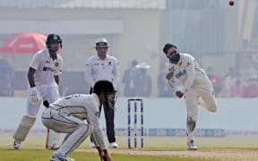 Ajaz Patel of New Zealand bowls first test India, 2021.