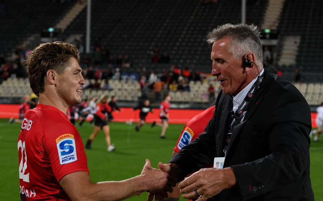 A happy Rob Penney Coach of the Crusaders talk with James O'Connor, 2025.