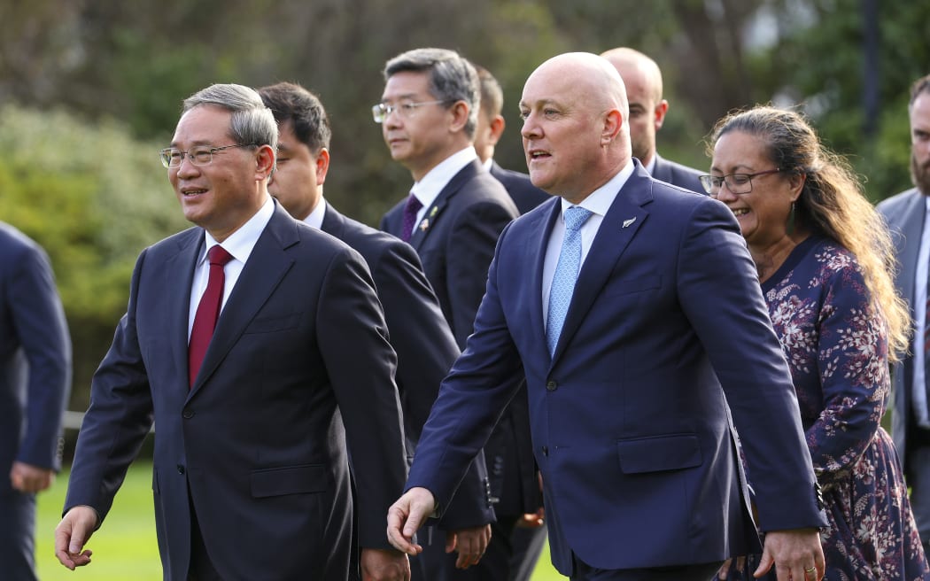 WELLINGTON, NEW ZEALAND - JUNE 13: Premier of the People’s Republic of China, Li Qiang, and Prime Minister Christopher Luxon look on during an official welcome at Government House on June 13, 2024 in Wellington, New Zealand. Li is in New Zealand for a three-day official visit. China is New Zealand's largest trading partner for trade in goods, both in terms of imports and exports. In 2022, bilateral trade reached almost US$25.2 billion, with Chinese exports to New Zealand valued at US$9.2 billion and imports from New Zealand valued at almost US$16 billion. (Photo by Hagen Hopkins - Pool/Getty Images)