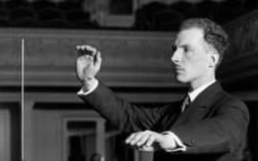 Lev Termen demonstrating the theremin.