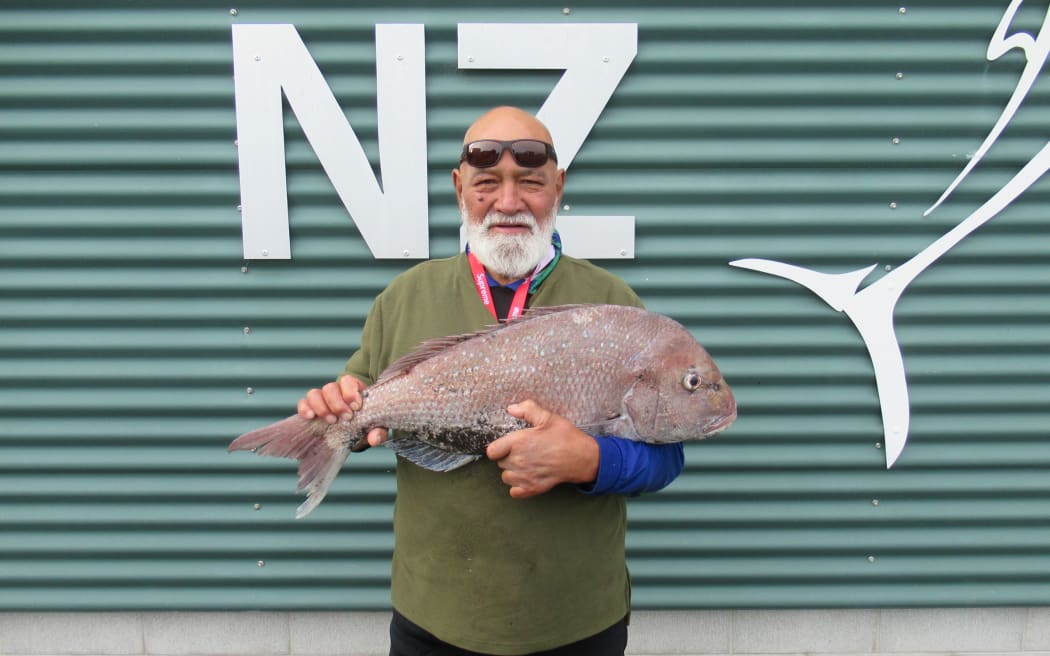 Laurie Te Kahika with his 7.7kg snapper at weigh-in.