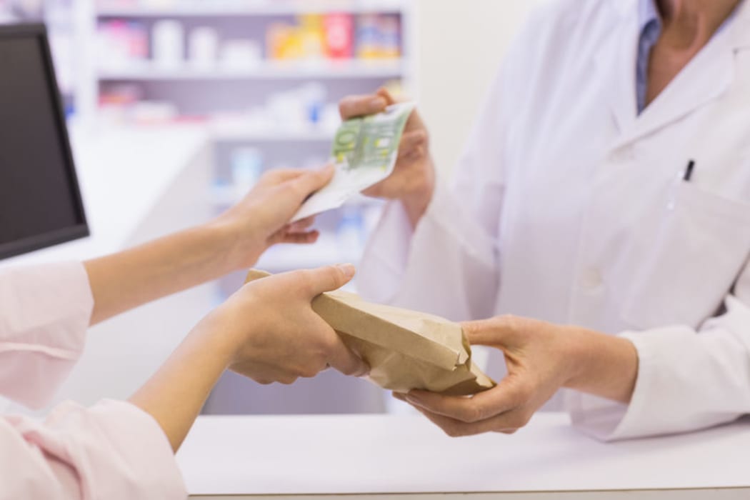 Some pharmacies are charging consumers 20 cents to $1 more per prescription than their contract entitles them to.
