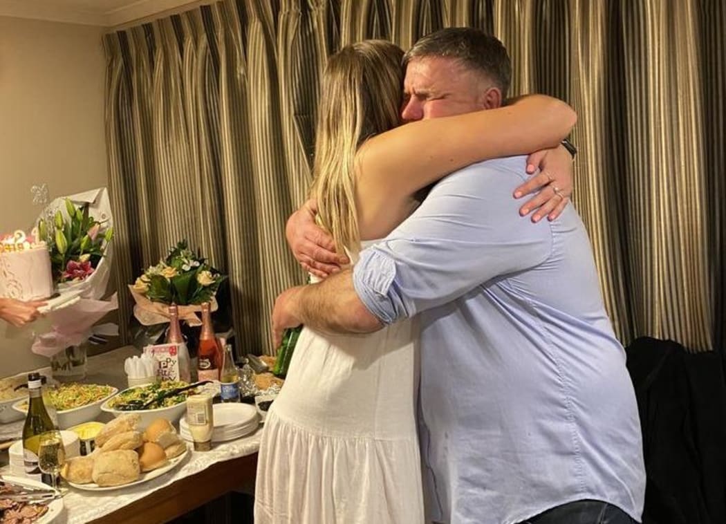Jessica and her father at her 21st Birthday party.