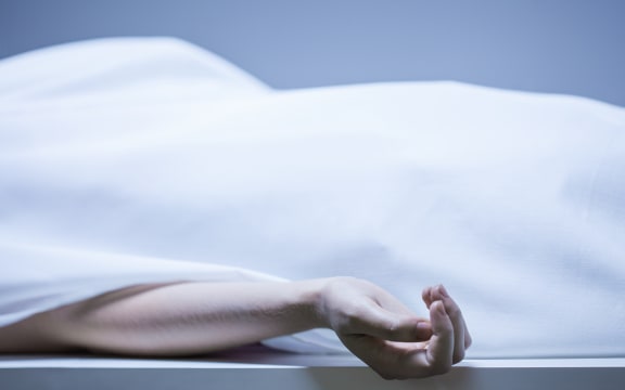 Remains of person in the morgue, horizontal