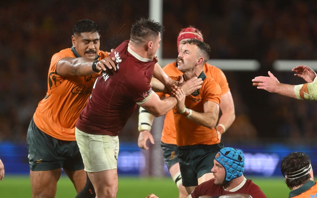 Nic Whiteof Australia and Dan Sheehan of the British and Irish Lions get into a confrontation.