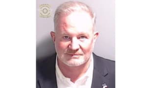 This handout image released by the Fulton County Sheriff's Office on August 23, 2023 shows the booking photo of poll watcher Scott Hall. The first co-defendants in the election racketeering case targeting former US president Donald Trump surrendered to the authorities in Georgia on August 22. John Eastman, a former campaign attorney for Trump, and Scott Hall, a bail bondsman, were booked at the Fulton County Jail, according to jail records. (Photo by FULTON COUNTY SHERIFF'S OFFICE / AFP) / RESTRICTED TO EDITORIAL USE - MANDATORY CREDIT "AFP PHOTO / FULTON COUNTY SHERIFF'S OFFICE " - NO MARKETING - NO ADVERTISING CAMPAIGNS - DISTRIBUTED AS A SERVICE TO CLIENTS