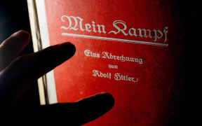 A signed copy of a first edition Mein Kampf on display at a London auction house.