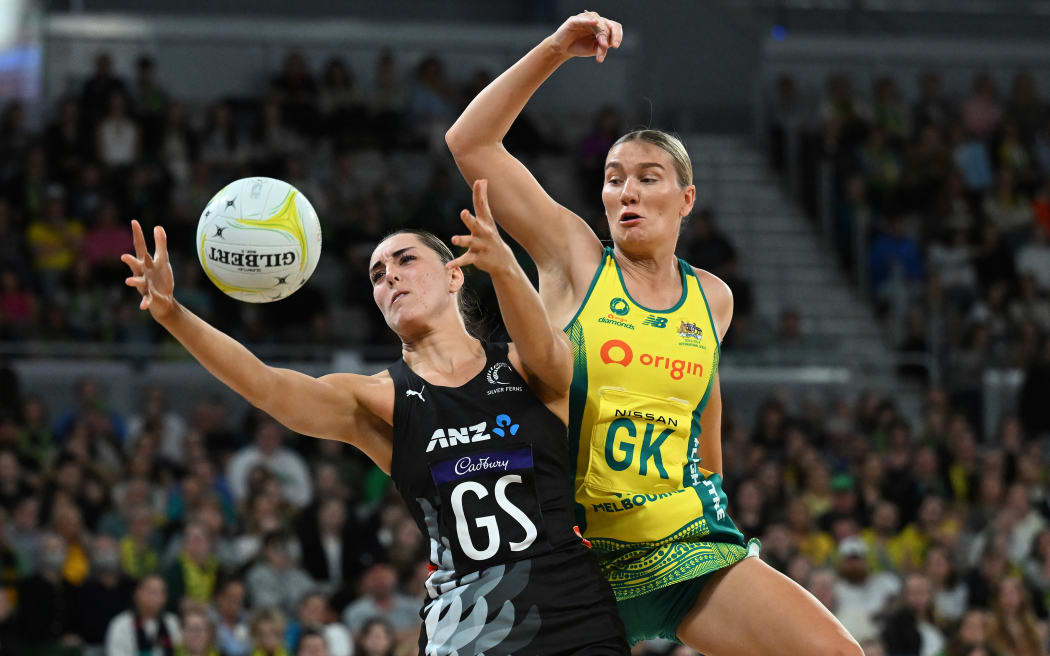 Silver Fern Amelia Walmsley and Australia's Courtney Bruce battle for possession in the opening Constellation Cup netball test in Melbourne.