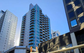 City Gardens Apartments on Albert Street surrounded by roadworks and the City Rail Link project in Auckland central, CBD, on 18 April 2024.