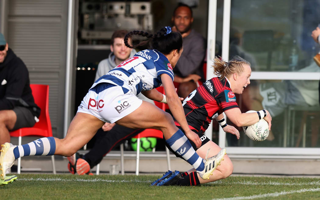 Kendra Cocksedge of Canterbury scores a try in her last game for the province.
