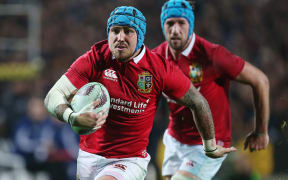 Lions winger Jack Nowell heads for the try line.