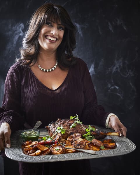Ashia Ismail-Singer serving her roast lamb dish.