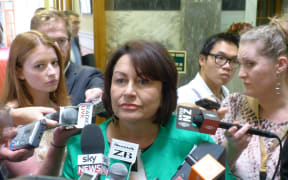 Hekia Parata speaking to reporters at Parliament.