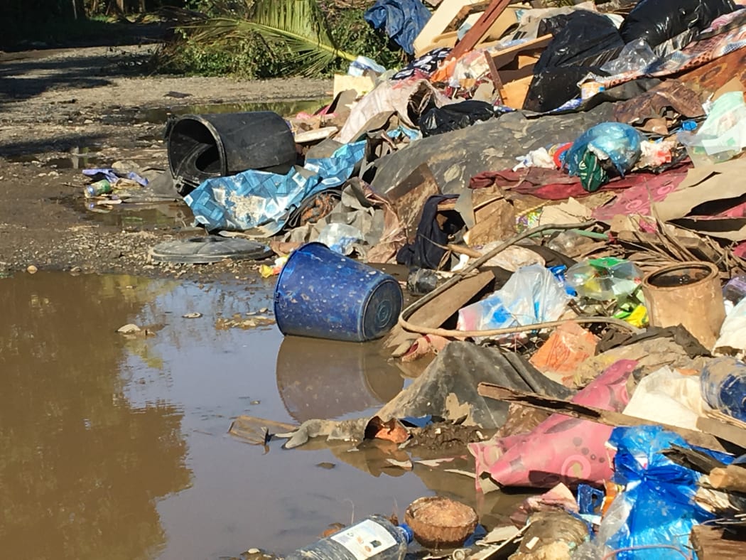 Rubbish piled up after floods in a settlement in Nadi, Fiji