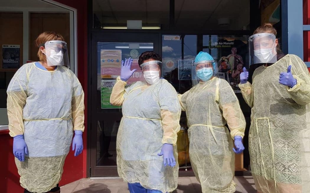 Staff at Ruatoria community health centre with the face shields made by  Te Kura Kaupapa Māori o Te Waiu o Ngāti Porou.