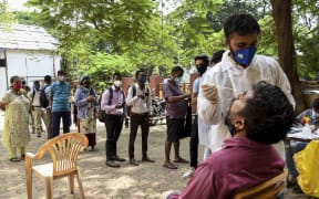 India surged past 13 million coronavirus cases.
