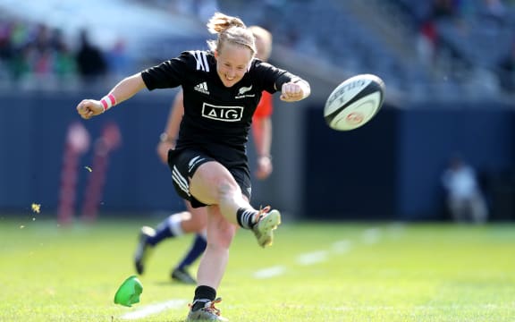 Black Ferns' Kendra Cocksedge kicks a conversion.