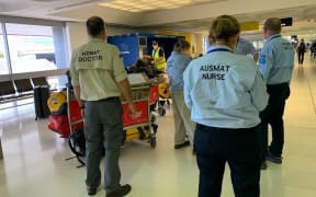 Members of the AUSMAT team arrive in Fiji.