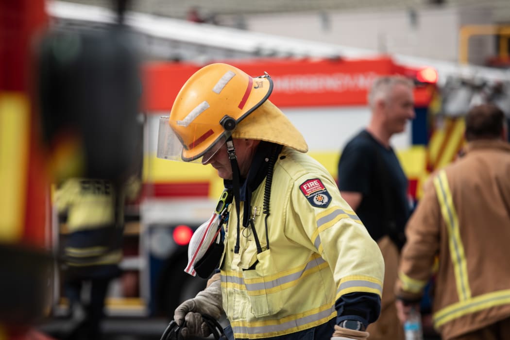 Firefighters at a blaze at house in Yule Street, Wellington.