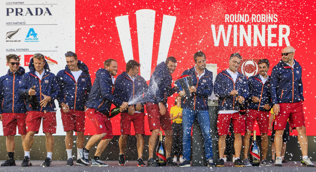 Team UK celebrate finishing top of the America's Cup Challenger Selection Series round robin.