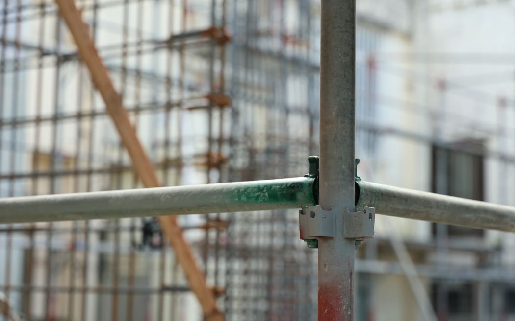 Stock photo of scaffolding at a construction site.