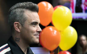 Pop star Robbie Williams celebrates his 44th birthday at The Northern Club in Auckland.