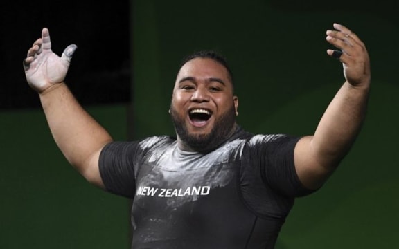 Liti on his way to winning his gold medal in the men's +105kg weightlifting