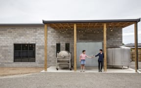 Alexia Winemaker Jane Cooper and her wife Lesley Reidy at their purpose-built urban winery in Greytown.