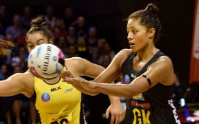 Magic's Kristiana Manu'a makes a pass during the ANZ Champs Pulse vs Magic netball match at TSB Arena in Wellington on Monday the 04 April 2016. Copyright Photo by Marty Melville / www.Photosport.nz