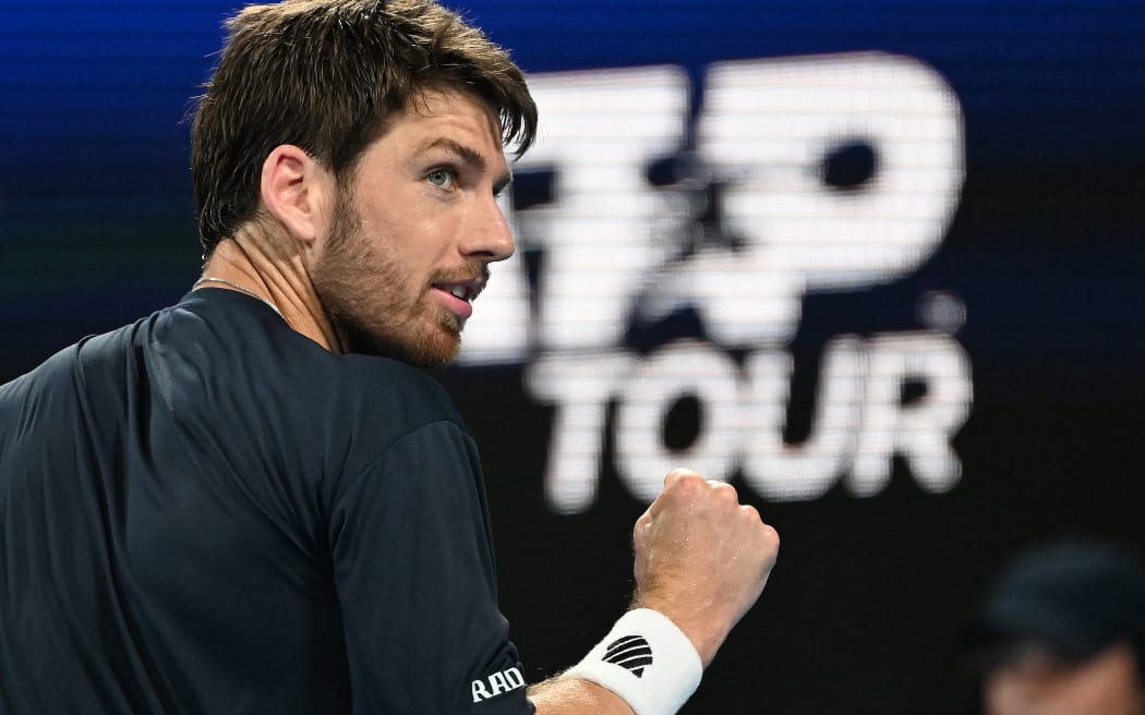 Britain's Cameron Norrie reacts after a point against Taylor Fritz of the US during their men’s singles match of the United Cup tennis tournament in Sydney on January 4, 2023. (Photo by Saeed KHAN / AFP) / -- IMAGE RESTRICTED TO EDITORIAL USE - STRICTLY NO COMMERCIAL USE --