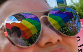 Supporters attend the annual "Pink Dot" event in a public show of support for the LGBT community at Hong Lim Park in Singapore on 18 June 2022.