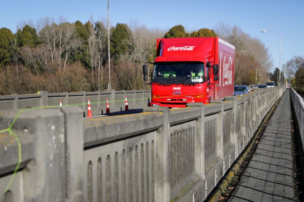 A truck passes over the Ashburton river bridge.