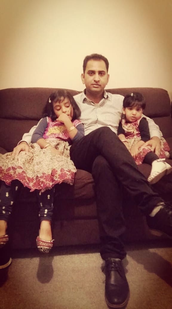 Muhammad Suhail Shahid and his two daughters.