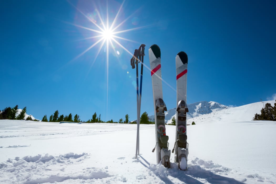Skiing, winter season , mountains and ski equipment on ski run
