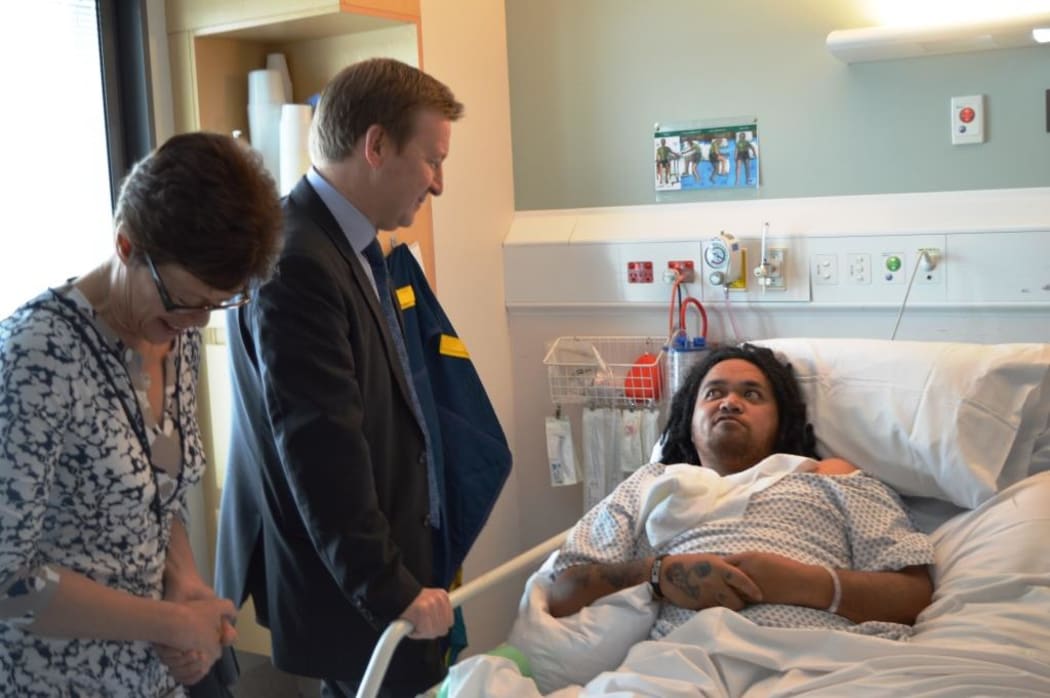 Health Minister Jonathan Coleman meets a stroke patient at Wellington Hospital.