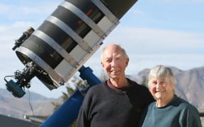 The couple with their home telescope in Tekapo in 2020